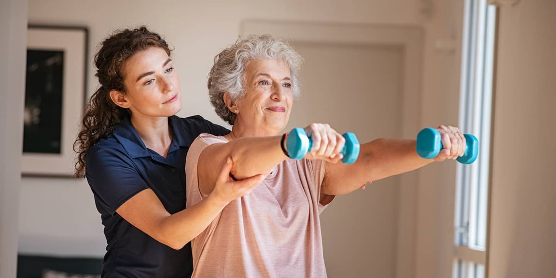 women working on physical therapy